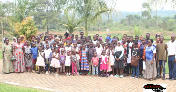 OVCs RECEIVING SCHOLASTIC MATERIALS